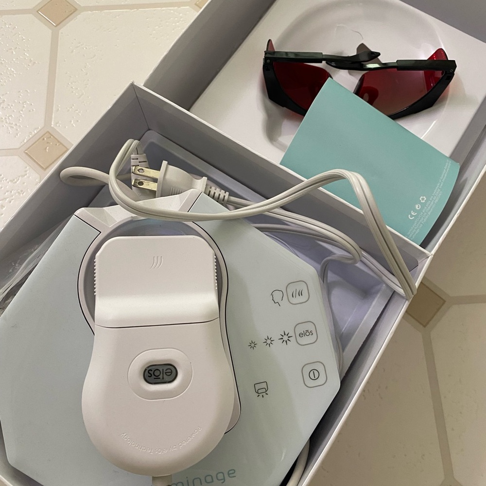 At-Home IPL Hair Removal Device in White with Red Safety Glasses